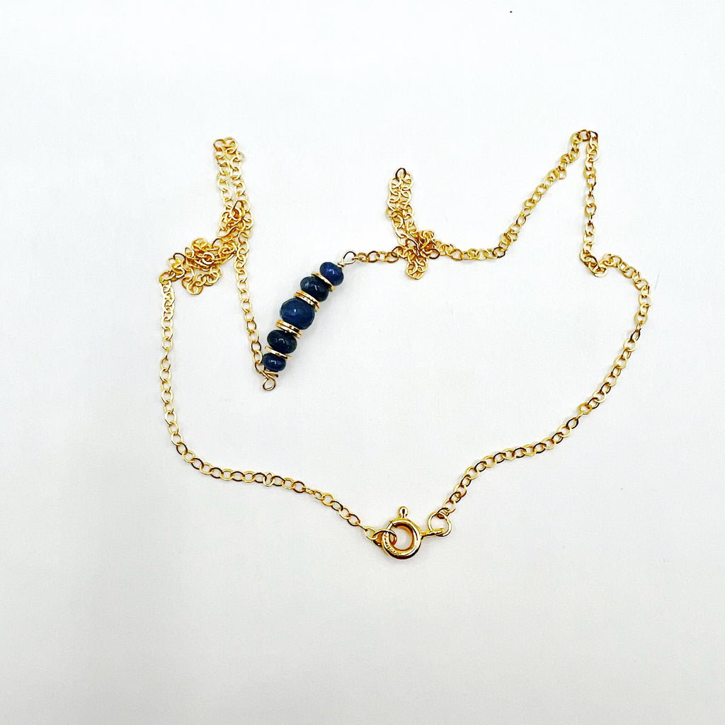 Blue Sapphire Beads on a Golden Chain