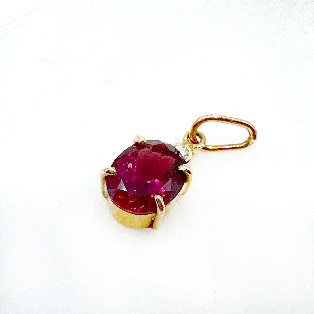 Bright Red Tourmaline with a Diamond Accent