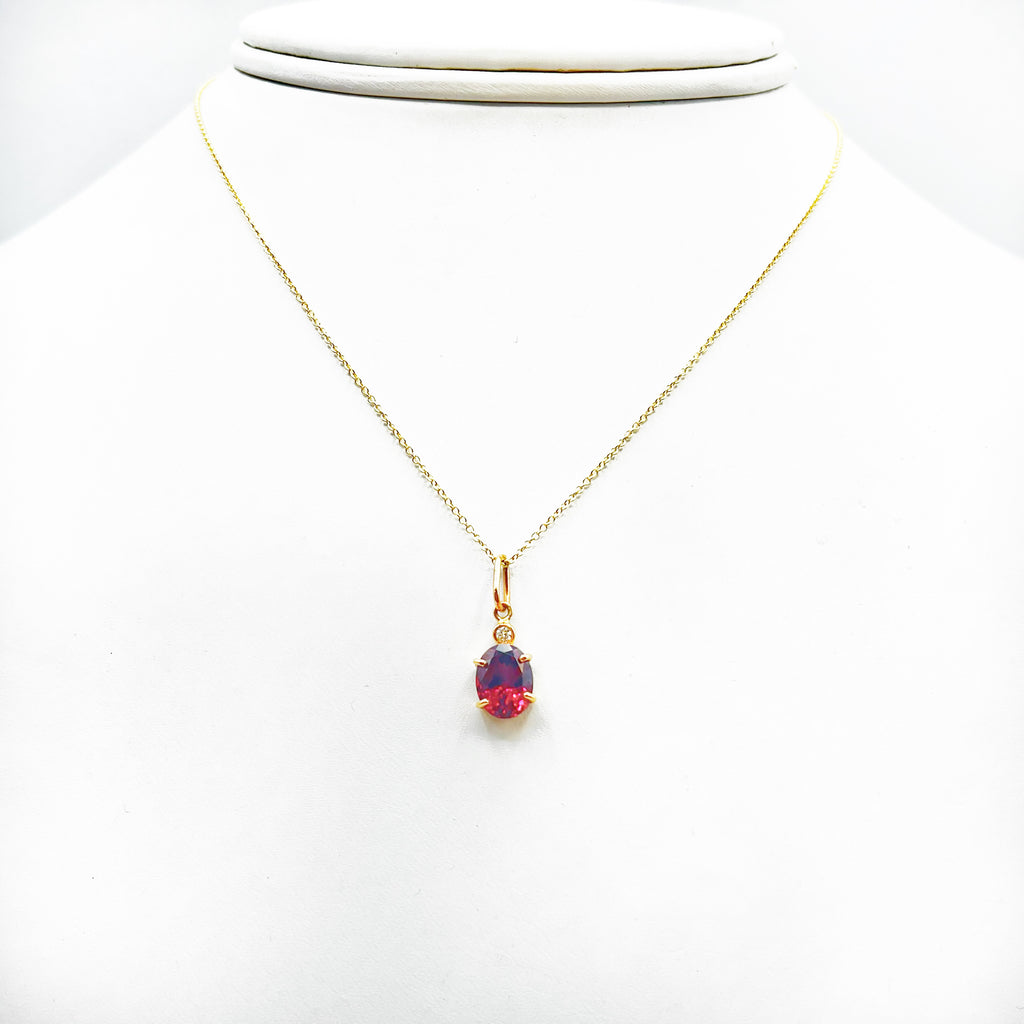 Bright Red Tourmaline with a Diamond Accent