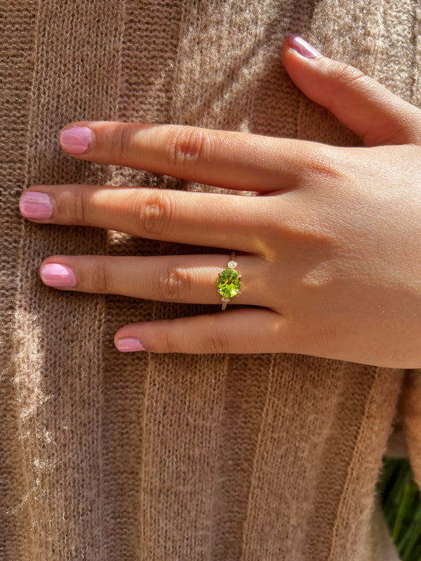 Viridescent Oval Peridot Ring with Diamonds