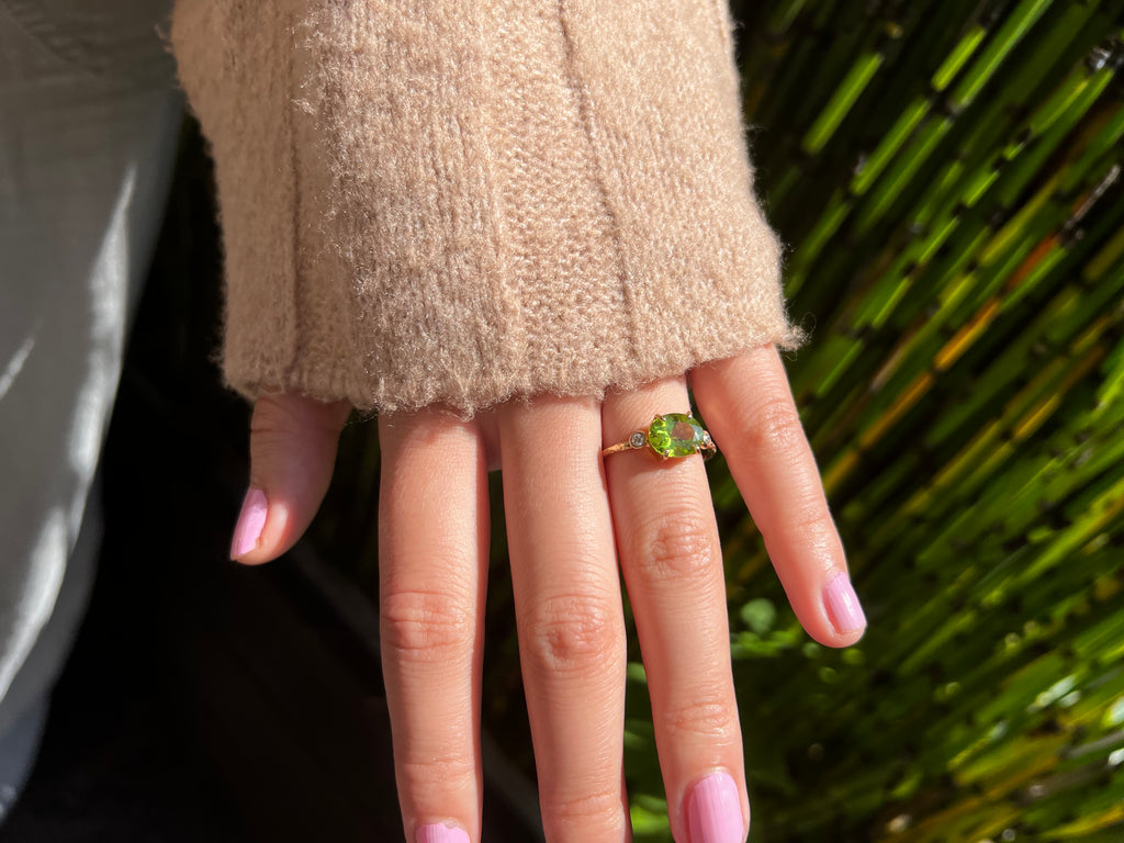 Viridescent Oval Peridot Ring with Diamonds