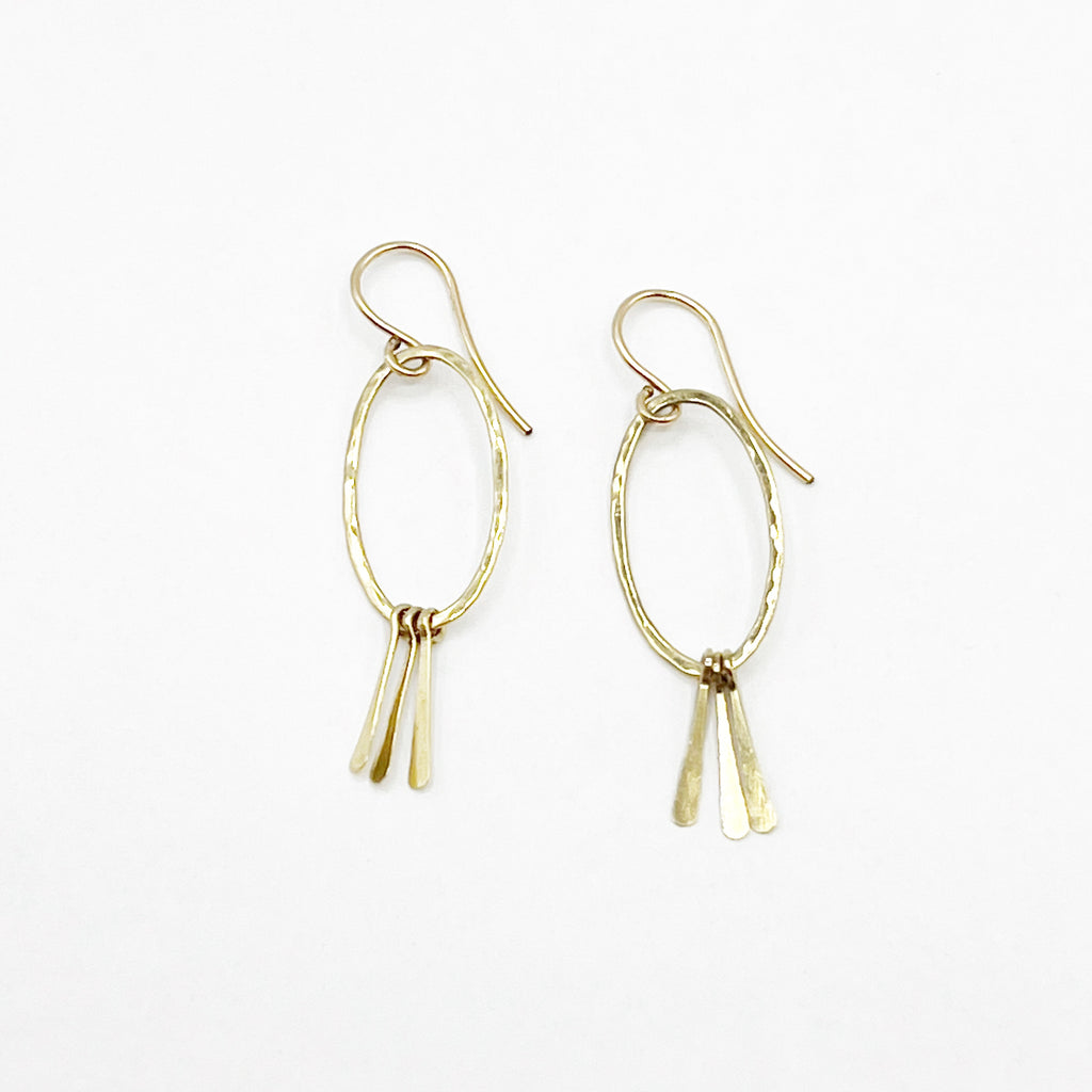 Gold Hammered Ovals With Dainty Tassels Earrings